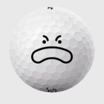 Golfbolde med surt ansigt