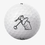 Golfbolde med kvindelig golfspiller