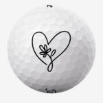 Golfbolde med hjerte og blomst